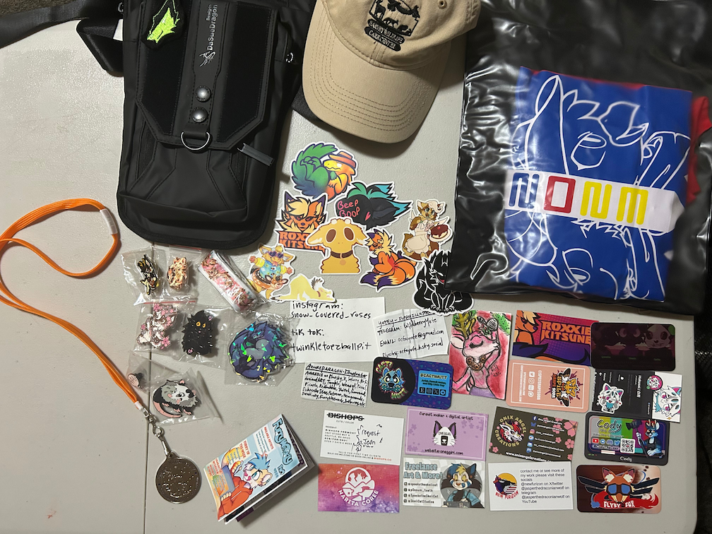 Collection of plush and fuzzy items purchased at the convention